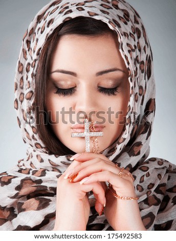 beautiful woman prays