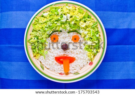 Creative rice face shape with vegetables