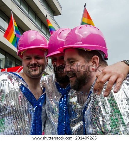 LONDON - JUNE 28: People take part in London's Gay Pride, 2014 Worldpride on June 28, 2014 in London, UK, estimated 25,000 people took part in the march, Parade to support gay rights.