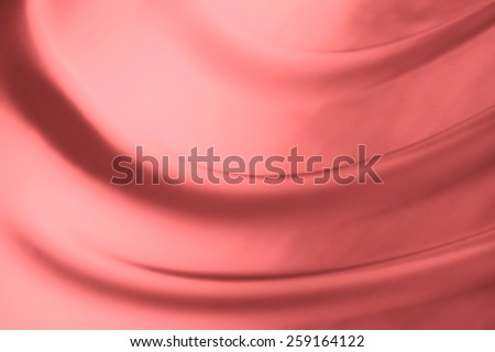 abstract background luxury cloth or liquid wave or wavy folds of grunge peach silk texture satin velvet material or luxurious