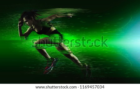 Woman sprinter leaving starting. Exploding start