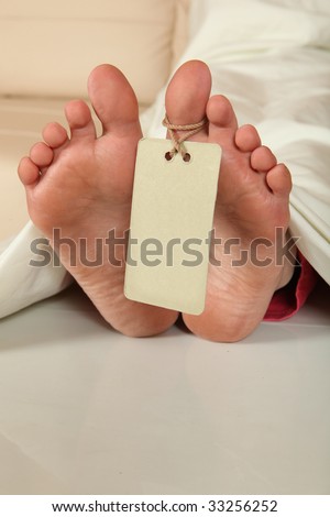 Human feet with identity tag