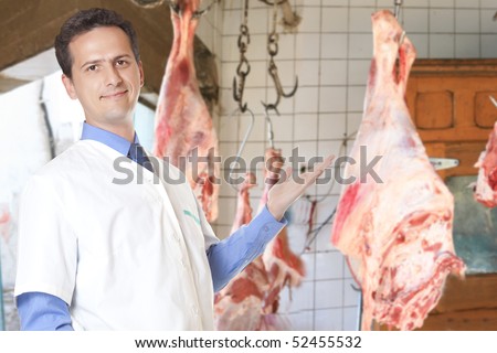 The butcher in a butcher\'s shop