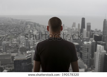 Man stay on the roof of skyscraper