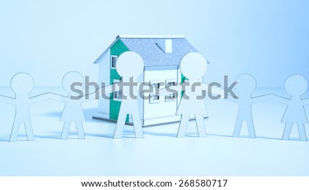 The paper family buys a home. Blue light