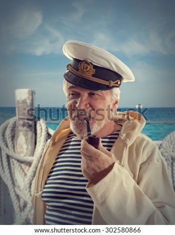 Captain. Sailor man in marina port with boats background