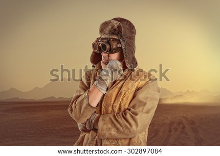 Steampunk man wearing glasses. Post-apocalypse fantasy