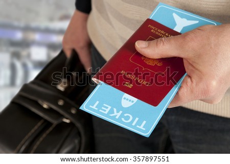 Customs control. Passport and ticket in hand in airport