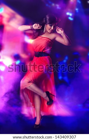 Full Lenght Portrait Of Dancing Girl At The Night Club