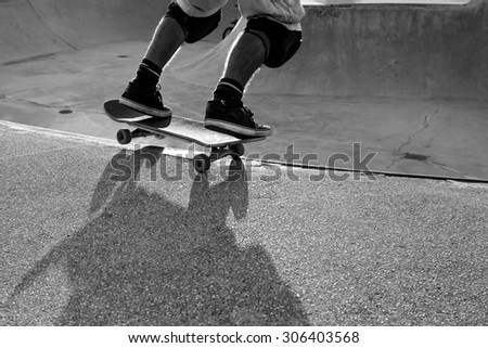 Skateboarder in a bowl of a skate park