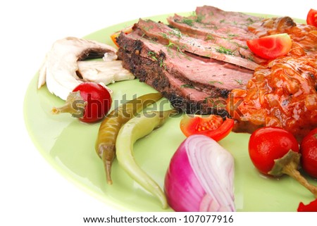 corned beef on plate with vegetables isolated over white