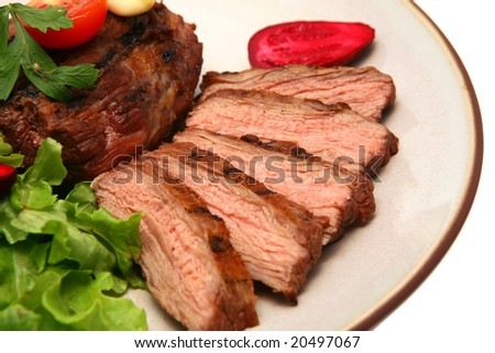 grilled meat steak on color dish