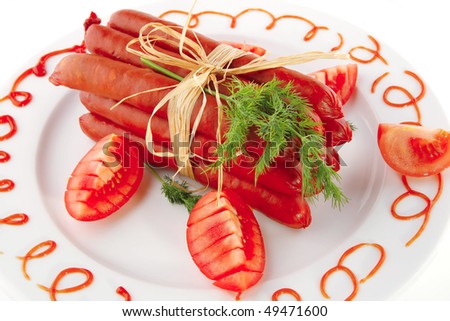 smoked beef sausages served on a white plate
