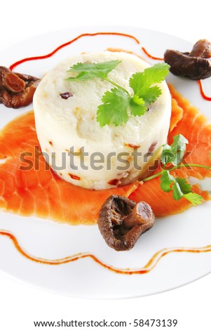 red salmon with mash served on ceramic plate
