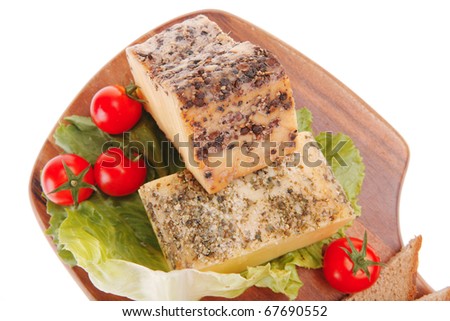 image of smoked cheese on wood with vegetables