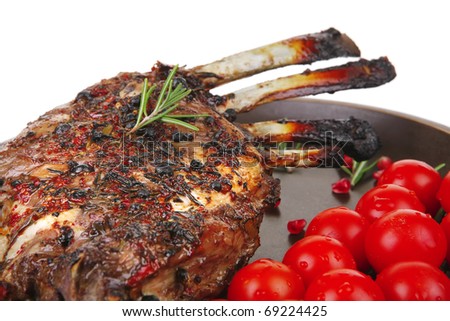 roasted rack of ribs served on plate