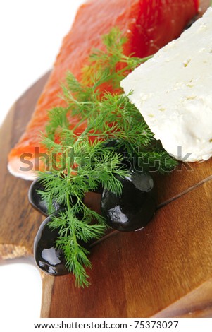 smoked salmon chunk with olives and white cheese