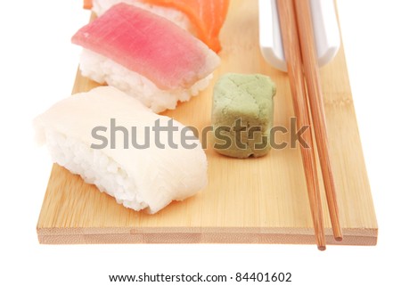 http://image.shutterstock.com/display_pic_with_logo/150613/150613,1315727518,1/stock-photo-japanese-cuisine-set-of-tuna-maguro-salmon-sake-and-eel-unagi-nigiri-sushi-with-wasabi-on-84401602.jpg