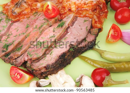 corned beef on plate with vegetables isolated over white