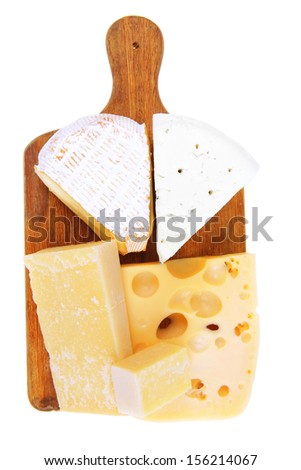 solid french cheese parmesan brie and edam on wooden platter isolated on white background