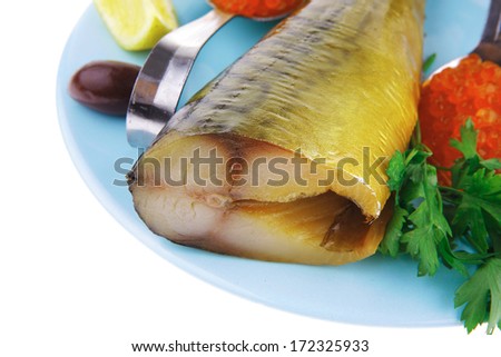 diet food - red caviar and smoked mackerel fish with lemon and dill on blue plate isolated over white background