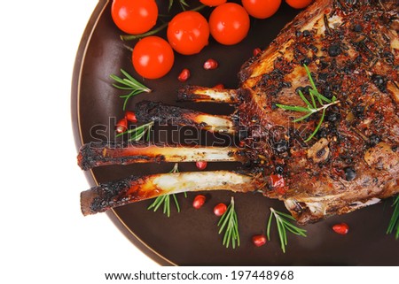 roasted rack of ribs served on plate