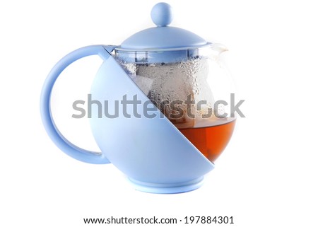 blue tea kettle with tea on white