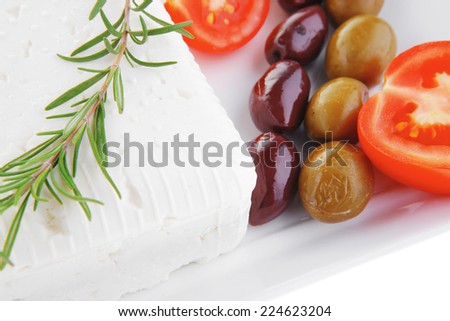 image of soft feta cube and bread toast on plate