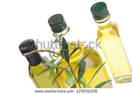 pure of oil and olives on white background
