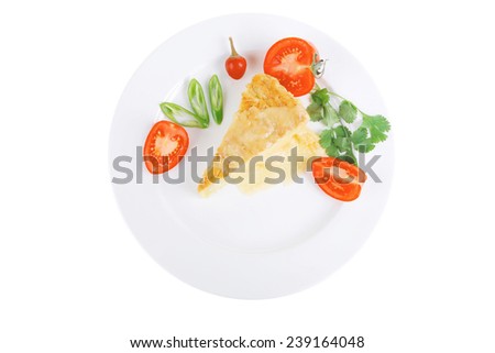 food : cheese casserole piece on white plate served with parsley and tomatoes isolated over white background
