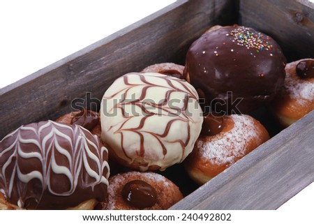 traditional jewish holiday chanuka donuts in retro vintage tray isolated on white background
