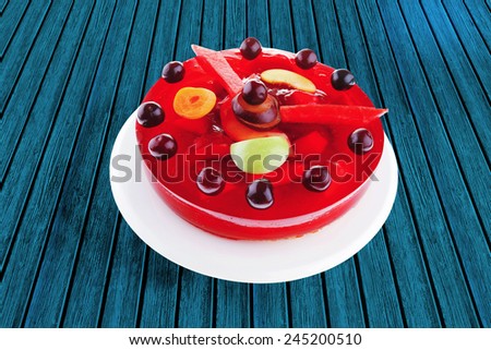 sweet cold red jelly cake with cherry and watermelon
