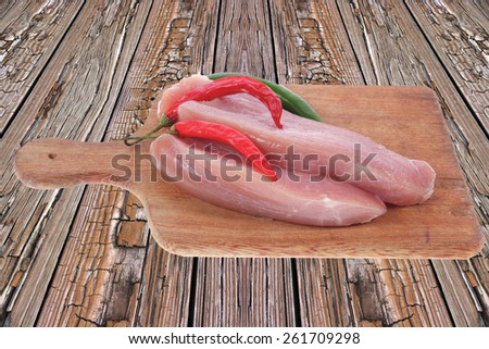 fresh raw turkey meat steak fillet over wooden table ready to cooking