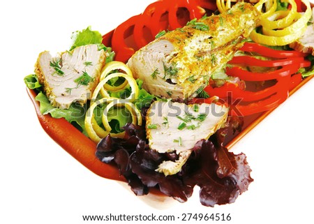 health dinner - atlantic light roast fish sea tuna served on plate with vegetables and lemon isolated on white background