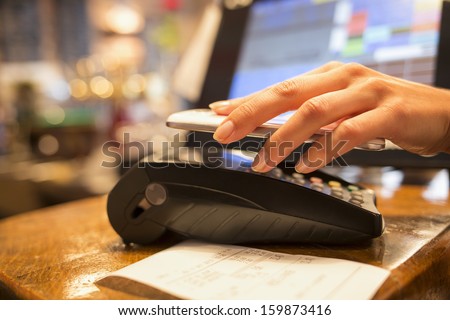 Woman Paying With Nfc Technology On Mobile Phone, Restaurant, Cafe, Bar