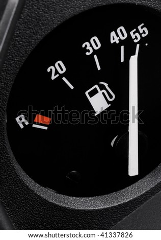 Fuel gauge in a car with position at full tank. Identifiable information are liters, reserve-mark and the pictogram of a petrol pump.