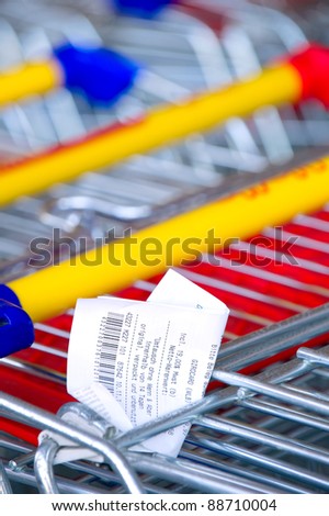 Receipts on a shopping cart
