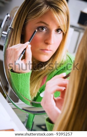 Woman testing eyeliner