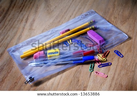 Zippered pencil bag of school supplies