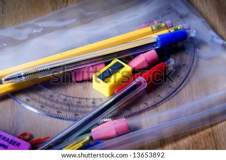Zippered pencil bag of school supplies
