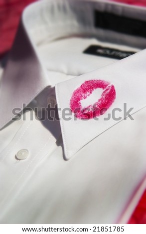 red lipstick on shirt collar