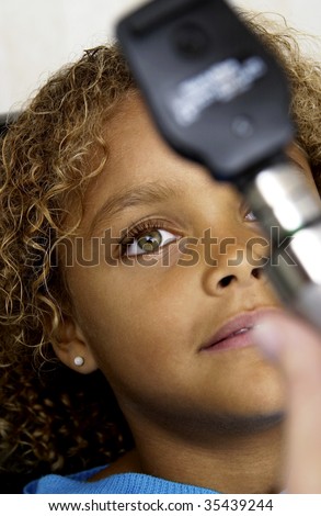 girl getting eye exam