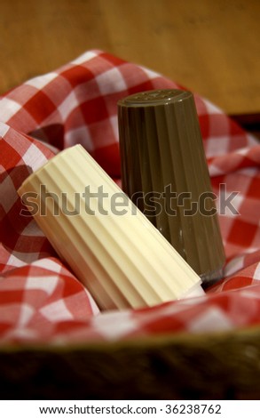 salt and pepper shakers on picnic cloth