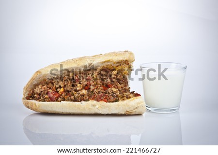 Turkish Kokorec - lamb intestine food sandwich and ayran with white background