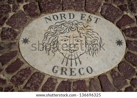 Rome, Italy, one of the Ancient Roman gods of wind. Located on the square in front of the Cathedral of St. Peter in the Vatican indicates the direction of the wind.