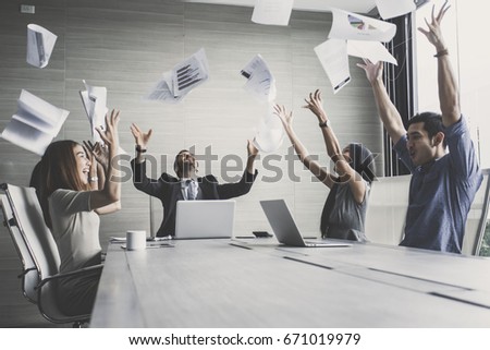 business team throwing paper when meeting success with happy emotion together, people with successful concept,