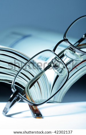 Journal and eyeglasses