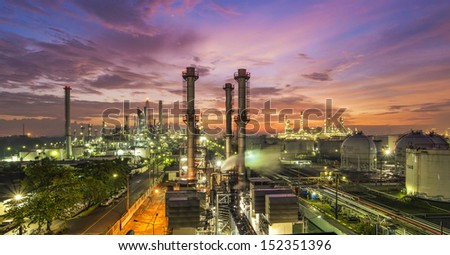 Oil refinery at dramatic twilight