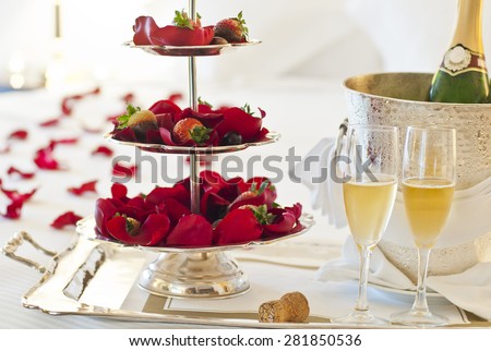 Beautiful honeymoon suite with chocolate strawberries and a bottle of champagne