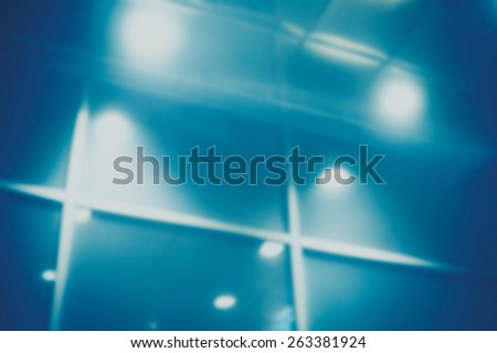 Abstract blur glass wall lights of an office building